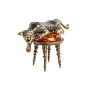 Resting cat on an ottoman