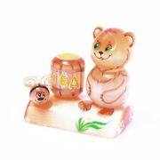 Bear with a barrel of honey